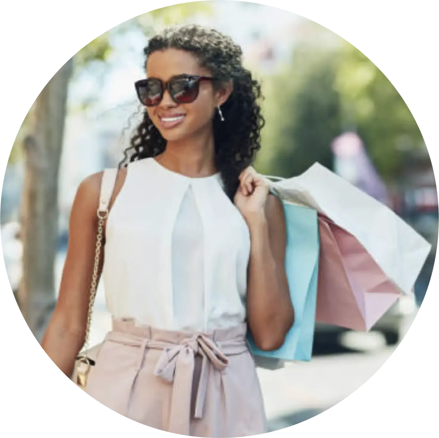 Happy shopper carrying bags